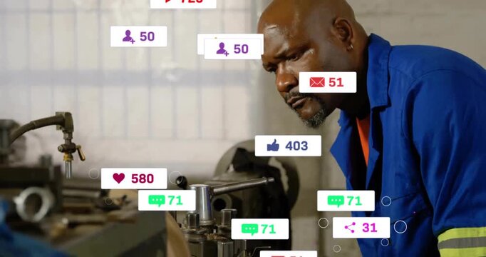 Machinist adjusting industrial lathe when icons appearing, distracting before fading to refocus