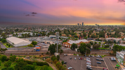 Obraz premium Panoramic Aerial Drone view of Inner Suburbs of Melbourne housing, roof tops, the streets and the parks, the roads and trees of Ascot Vale Moonee Ponds Brunswick Essendon and Maribyrnong in VIC Victor