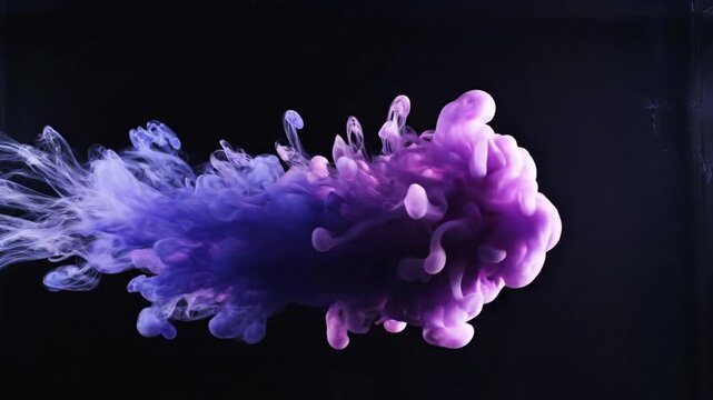 Abstract purple ink cloud swirling and dissolving in dark liquid, slow motion