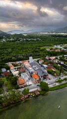 Fototapeta premium Aerial Waterfront Village Boats Restaurants Atlantic Forest Hills Lagoa Da Conceicao Florianopolis Brazil Island Coastal Scenery Santa Catarina South America Travel Destination