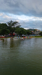 Fototapeta premium Aerial Waterfront Village Boats Restaurants Atlantic Forest Hills Lagoa Da Conceicao Florianopolis Brazil Island Coastal Scenery Santa Catarina South America Travel Destination