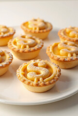 Mini Custard Tarts with Dollar Currency Symbol Decoration