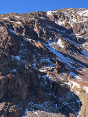 High Altitude Landscape of Rugged Moroccan Mountains with Patches of Snow