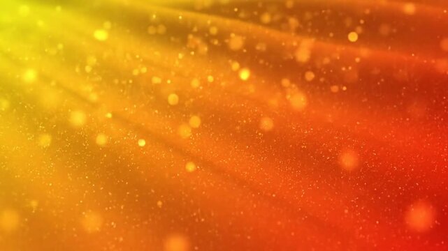 Abstract golden yellow and red rays of light with shimmering bokeh creating an elegant background.