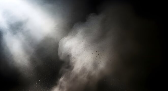 Smoke effect on dark background with light shining through