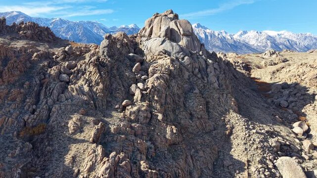 CALIFORNIA - 2.24.2026 - Beautiful aerial footage raising above the Sierra Nevada mountain range to reveal snow-capped peaks.
