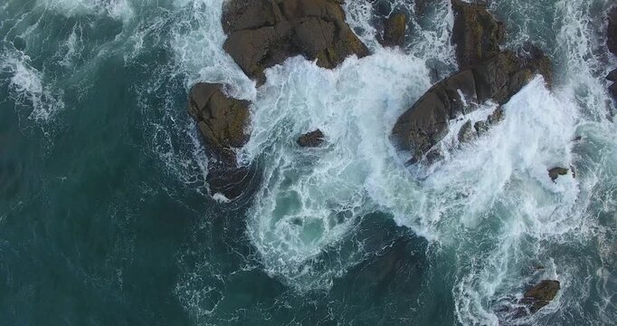 Aerial view of Matadeiro Beach with turquoise water and green mountains in Florianopolis, Brazil