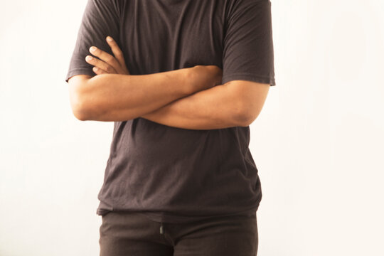 Person Standing with Arms Folded Isolated Background