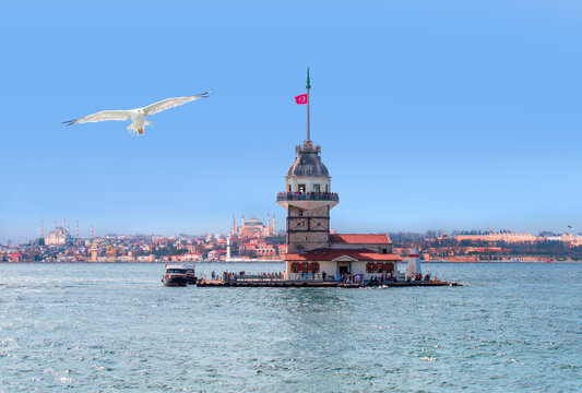 Istanbul Maiden Tower (kiz kulesi) -   Historical peninsula Hagia Sophia, Sultanahmet Mosque, Topkapı palace in the background - Istanbul, Turkey