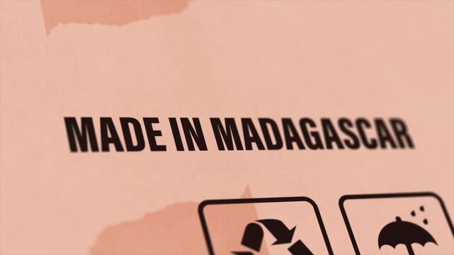 Made in MADAGASCAR Label on Cardboard Box, Animated MADAGASCAR Manufacturing Export Concept