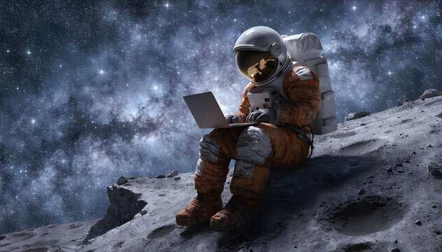Astronaut using laptop on moon surface with space stars and futuristic exploration concept in dark cosmic environment