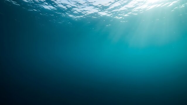 Illustration of underwater view looking up towards the bright sunlit surface of the deep blue ocean
