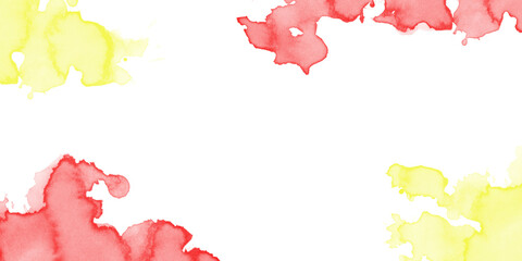 Fototapeta premium Artistic red and yellow watercolor splashes frame a dark black background creating an elegant abstract paint border area
