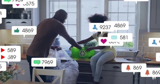 Father and daughter sorting recyclables after father pulling items from bag, notifications growing