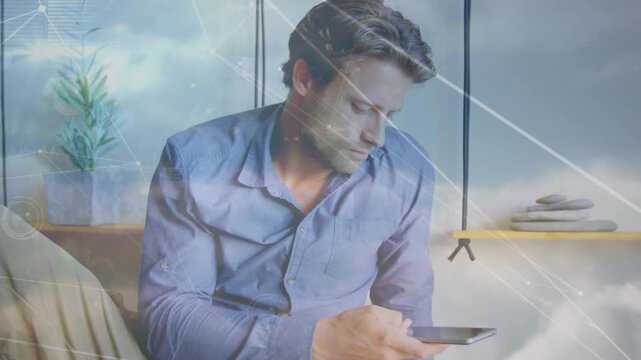 Mid-adult man tapping phone, extending phone outward, using device as remote with tech HUD over UI