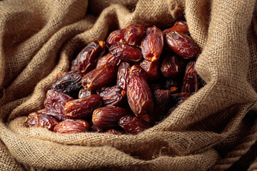 Dates in burlap bag.