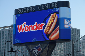 Naklejka premium advertising for Wonder (bread) on digital billboard at Rogers Centre Gardiner pylon, Bremner Blvd near Rees St, Toronto