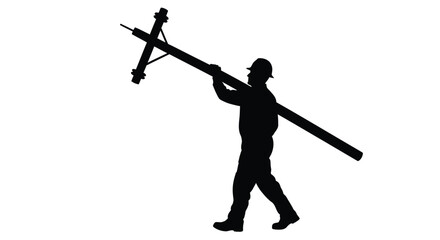 Silhouette of a lineman carrying a utility pole on his shoulder