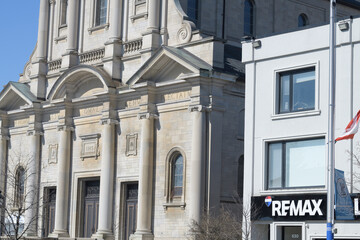 Naklejka premium exterior of Holy Name Parish and RE/MAX Hallmark Realty Ltd., Brokerage, a real estate agency, located at 630 Danforth Av, Toronto