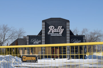 Naklejka premium facade and ghost sign of Rally Restaurant and Bar located at 1660 O'Connor Dr, North York, Toronto