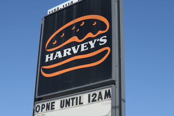 Naklejka premium roadside pylon sign of Harvey's, a restaurant chain, located here at 1100 O'Connor Dr, Toronto