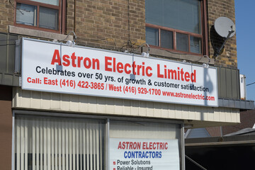 Naklejka premium exterior building facade and sign of Astron Electric - Licensed Electrician & Electrical Contractors Toronto located at 362 O'Connor Dr, East York, Toronto