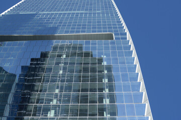 Naklejka premium oblique angle view of TD Terrace, a corporate office, located at 160 Front St W (designed by Adrian Smith + Gordon Gill Architecture) Simcoe St side, Toronto