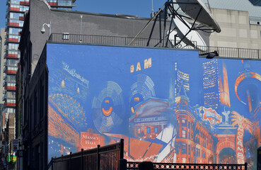 Naklejka premium mural on wall facing parking space outside 299 Queen St W (Bell Media), Toronto