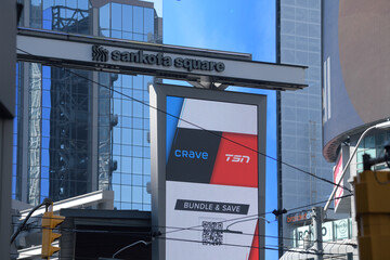 Naklejka premium CRAVE/TSN entertainment streaming services digital advertisment at Sankofa Square, Toronto