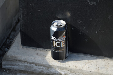 Naklejka premium isolated discarded can of Maximum Ice, brewed by Labatt Brewing Company, a subsidiary of the global giant Anheuser-Busch InBev, Toronto