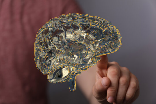 Artistic depiction of a brain with a person's finger touching it, representing intelligence, ideas, and thought processe