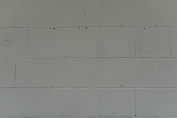 Close up of a gray concrete block wall texture. Suitable for backgrounds, textures and abstract concepts. Provides a sen © vegefox.com