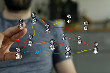 Hand forming connections concept, a person visualizing a network of individuals connected. Teamwork, communication and b © vegefox.com