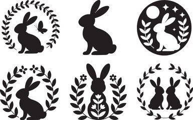 Fototapeta premium Set of six black silhouettes of easter bunnies and floral wreaths on transparent background