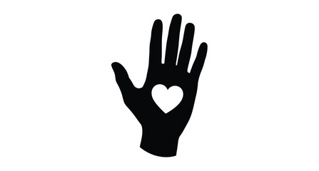 Fototapeta premium A black hand displaying a white heart shaped void silhouette