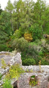 Dramatic Aerial Footage of Abandoned Rait Castle Ruins, Medieval Scottish Stronghold in Nairn Highlands