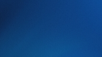 Fototapeta premium A textured blue surface with a subtle gradient effect visible in the image.