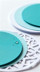 Stacked Turquoise Paper Circles with Water Drops and Cutout