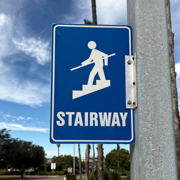 Blue and white STAIRWAY sign