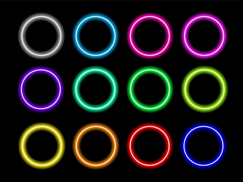 High quality set of twelve vibrant glowing neon circle rings in various colors like blue pink green and yellow isolated on a solid black background perfect for futuristic digital design.