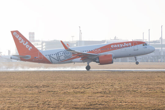 PRAGUE, CZECH REPUBLIC - MARCH 2026: An easyJet Airbus A320neo aircraft with a special engine livery landing on the runway at Vaclav Havel Airport Prague (PRG).