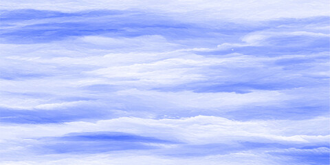 Beautiful summer day featuring fluffy white cumulus clouds drifting across a clear blue sky as bright sunlight illuminates the natural beauty of the airy atmosphere © ITS OK