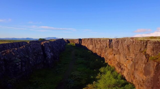 Drone view flying over the Mid Atlantic Ridge rift valley separating two tectonic plates