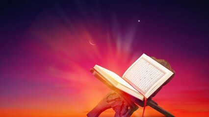 Obraz premium Red-Gold Holy islamic Quran Book in hand