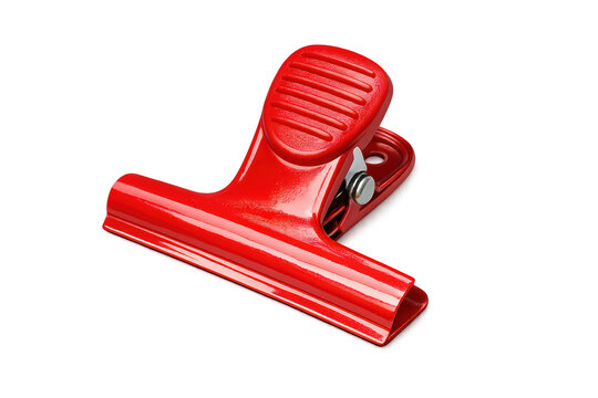 Red bulldog clip holding items together, a strong metal clamp for office, kitchen, and organizational tasks