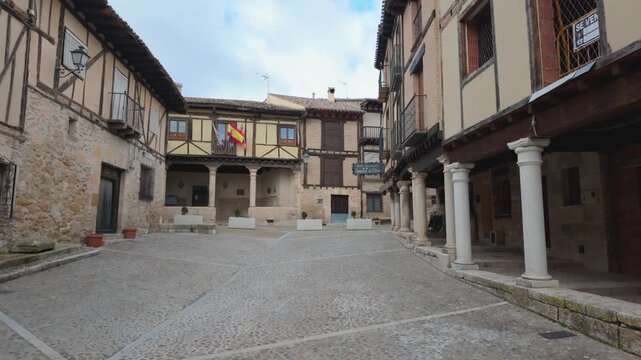 Pe&ntilde;aranda de duero main square with traditional castilian architecture and cobblestone pavement