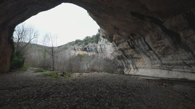 Puentedey village built on a natural limestone arch formed by the nela river