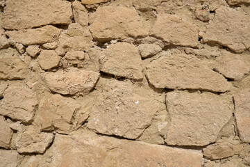 A medieval stone wall as a background.