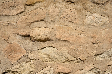 A medieval stone wall as a background.