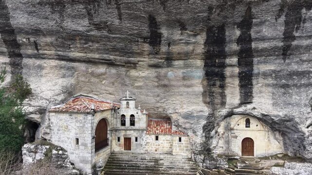 Ojo guare&ntilde;a hermitage built into rock cliff